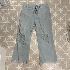 Trendy Distressed Flare Jeans in Light Blue